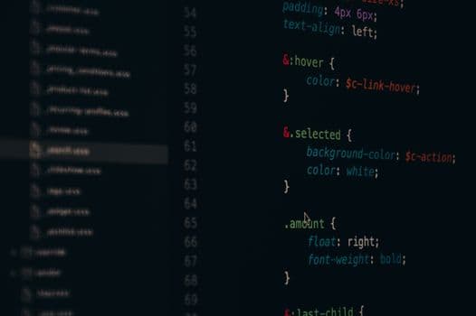 Close-up of colorful CSS code lines on a computer screen for web development.