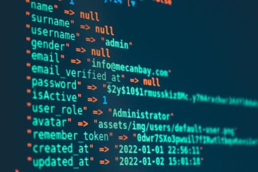 Vibrant close-up of code displayed on a monitor with various programming details.